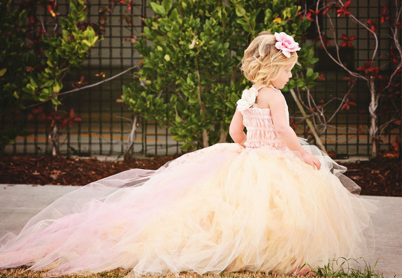 This pink x champagne flower girl dress with detachable train is so adorable!