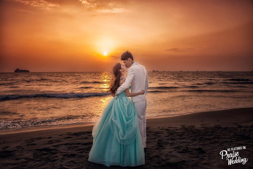 Love the color contrast between the blue ball gown and orange sunset