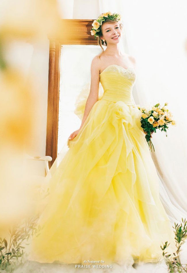 Contemporary and chic, yet refreshing and unique, this yellow gown from Ecru Spose has captivated us all!
