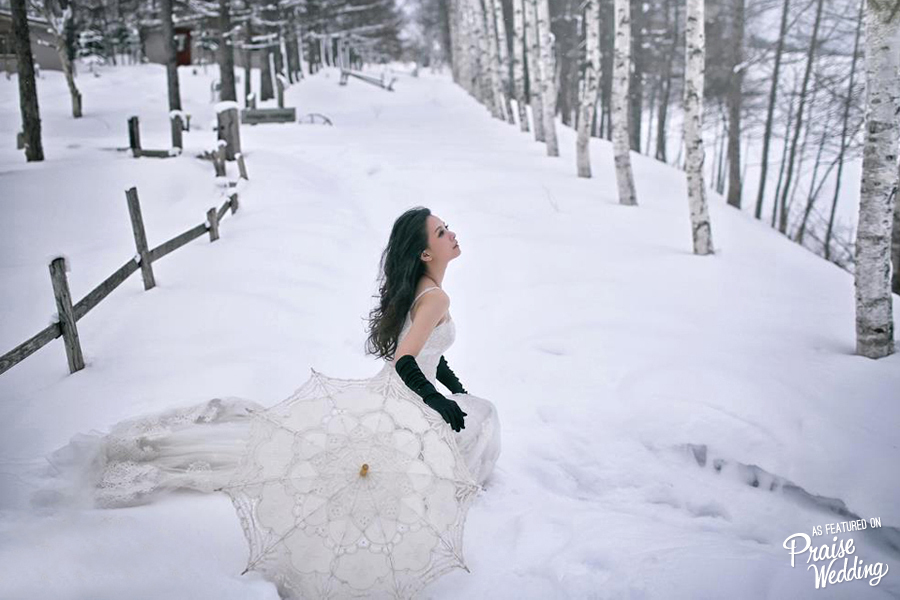 Stylish bride in snow