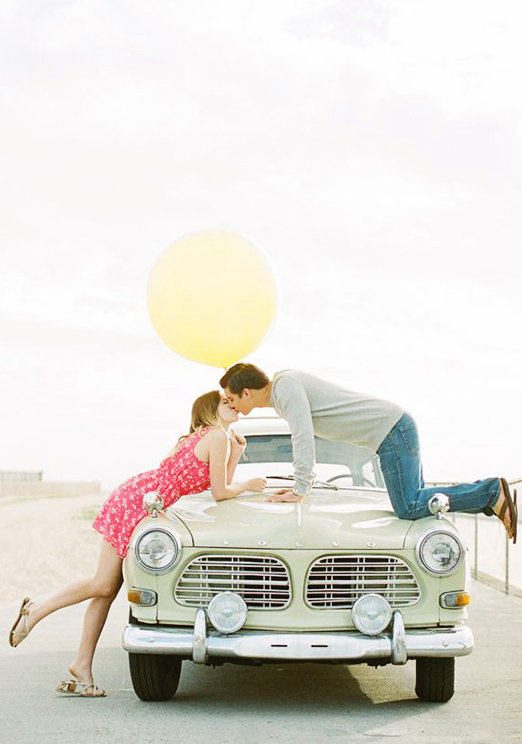 Romantic & fun summer engagement session with oversized balloon & vintage car