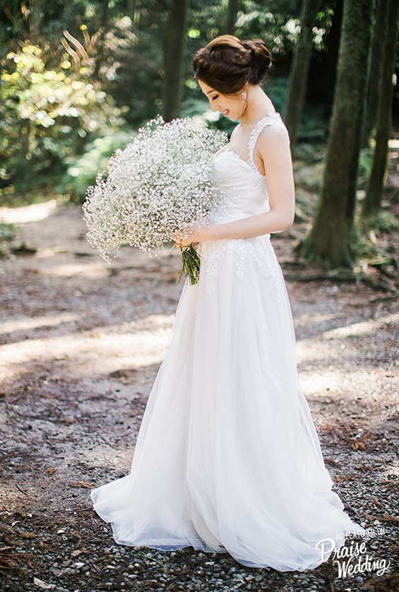 The oversized baby's breath bouquet completed this Bride's rustic meets elegant look!