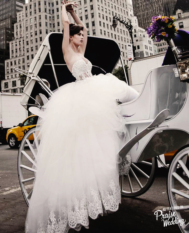 For stylish princess brides - we love the waist details and fluffy skirt of this Pnina Tornai wedding dress!