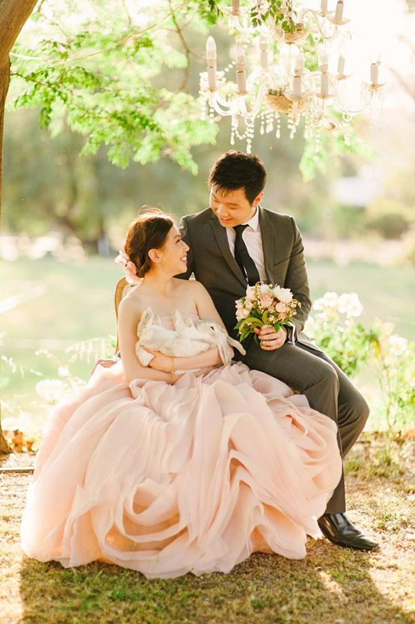 Utterly romantic fairytale mix of pink ruffled gown + rustic chandelier + an adorable baby rabbit!