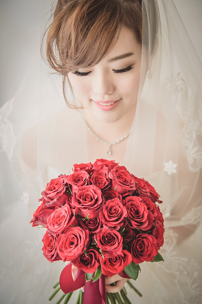 Red for love! This bouquet is full of tradition and timeless touches!