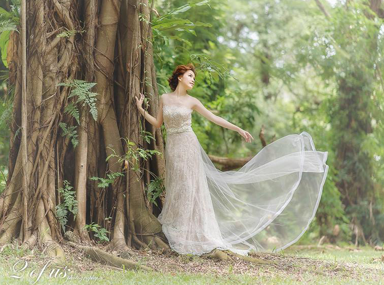 A romantic, ethereal bridal portrait with whimsical details and rustic touches