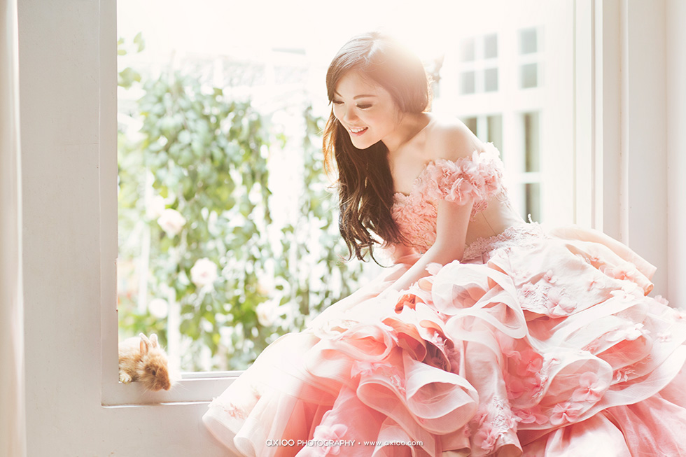 Sweet bridal portrait featuring the prettiest off-shoulder pink floral ruffle gown!