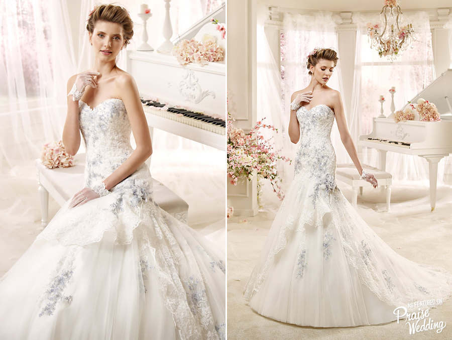 Classic lace with a touch of blue, this sweet gown by Nicole Spose is absolutely gorgeous!