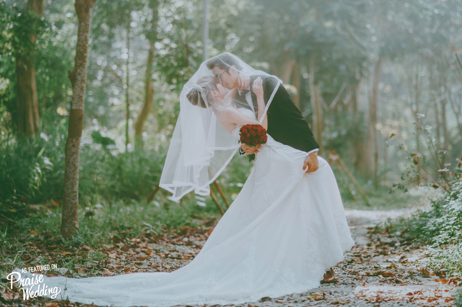 What's more romantic than stealing a kiss under your veil in the forest?