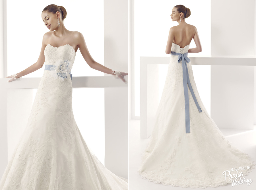 An classy way to wear your "something blue", this elegant Nicole Spose gown is absolutely beautiful!