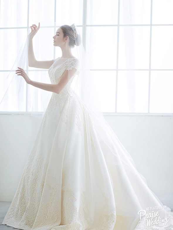 This classy wedding dress by Jaymi Bride is defined by elegant silhouette and delicate embellishments, imbued with a touch of fairy tale romance!