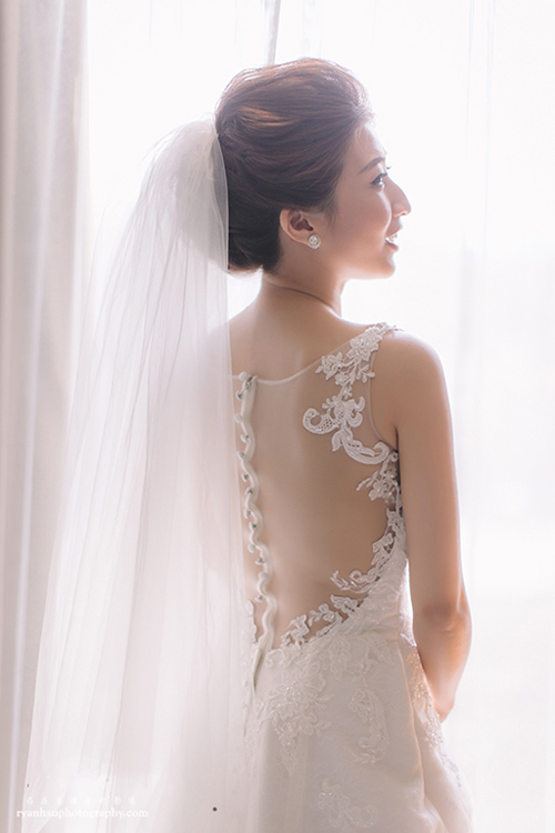 Everything from the stunning illusion back details to the Bride's contagious joy, this bridal portrait is absolutely gorgeous! 