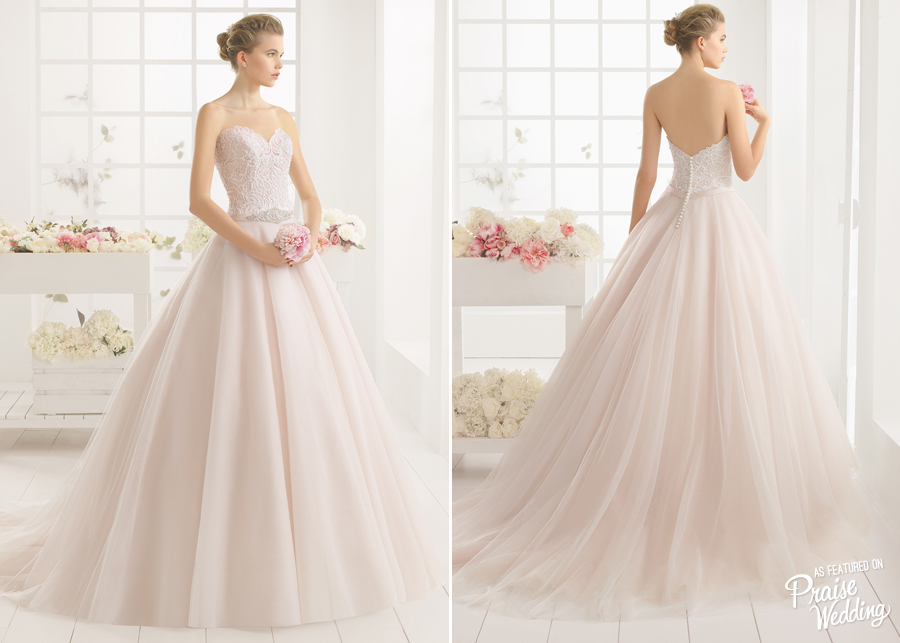 A touch of pink makes this Aire Barcelona wedding dress sweeter than honey!