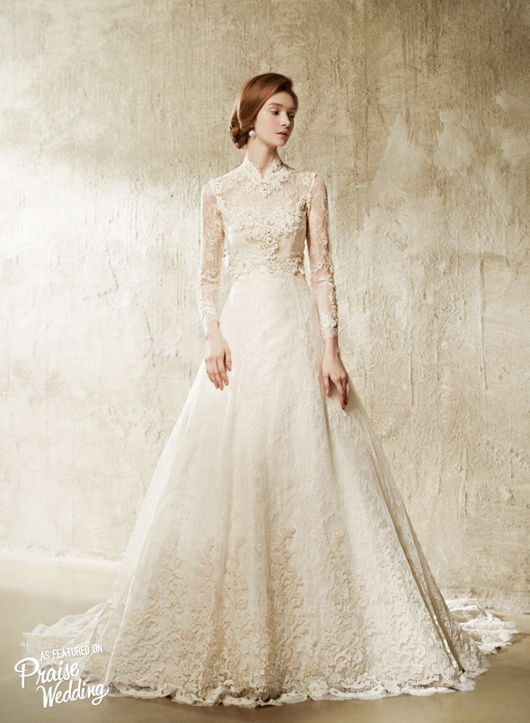 Laced illusion sleeves with high neck design, this Valeria Sposa vintage-inspired gown is utterly romantic!