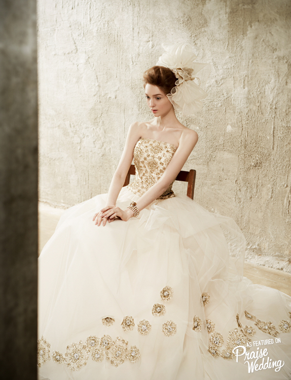 This Valeria Sposa gown is timelessly sophisticated and adorned with the most gorgeous details!