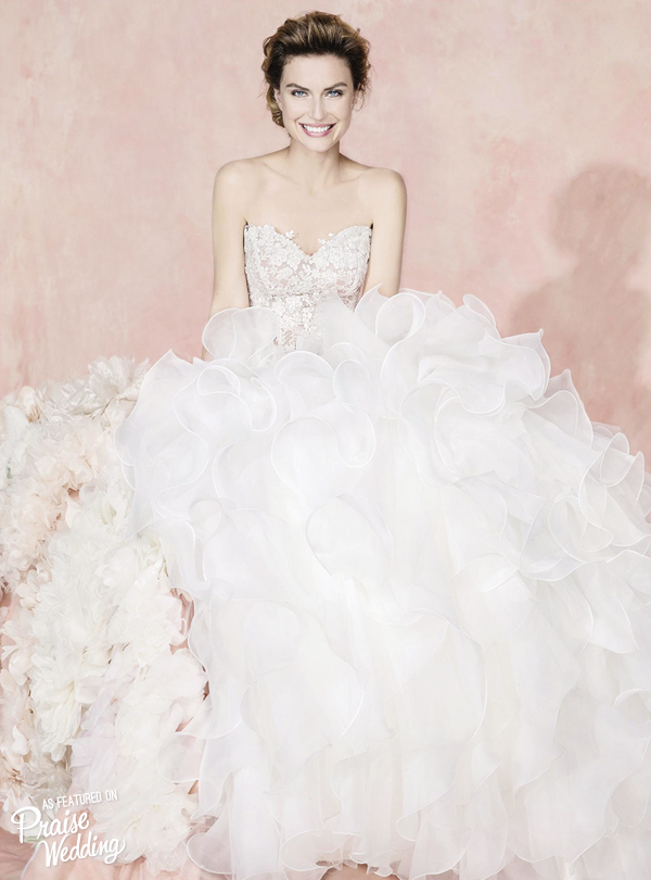 When lace meets ruffles, the result is pure magic! This Carlo Pignatelli gown has officially stolen our hearts!
