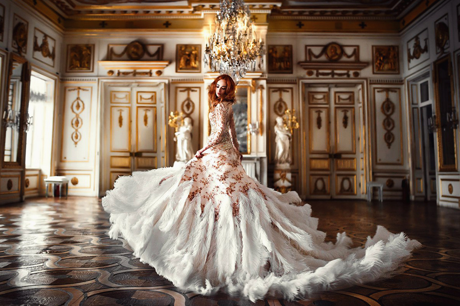 This timeless bridal portrait featuring a rose gold feather gown is taking our breath away!
