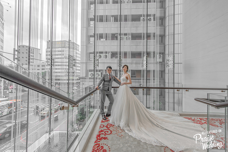 What a modern, stylish way to capture the city view while showing off the Bride's gorgeous gown!