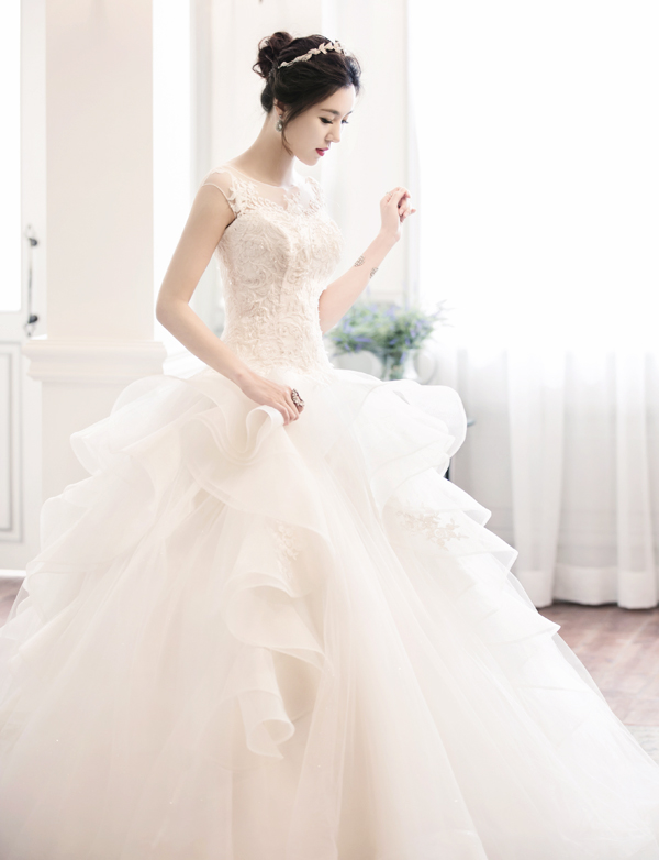This voluminous ruffled ball gown from Tyche Dress is downright droolworthy!