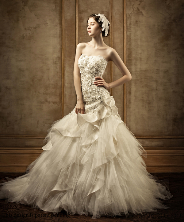 A timeless dress that embodies a soft, ethereal feel, this Tyche Dress bridal gown is a show stopper!