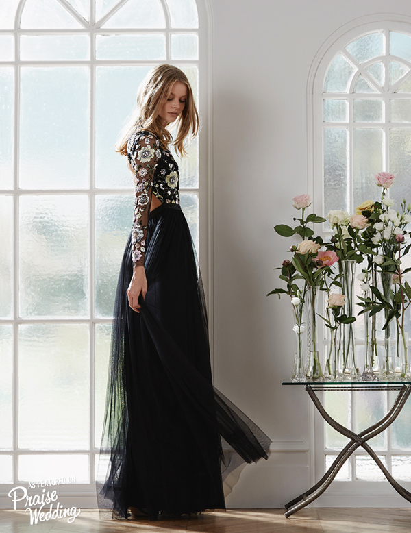 Sparkling beads and sequins in beautiful floral patterns illuminating the long-sleeve bodice, this black evening gown from Needle & Thread is officially on our wish list!