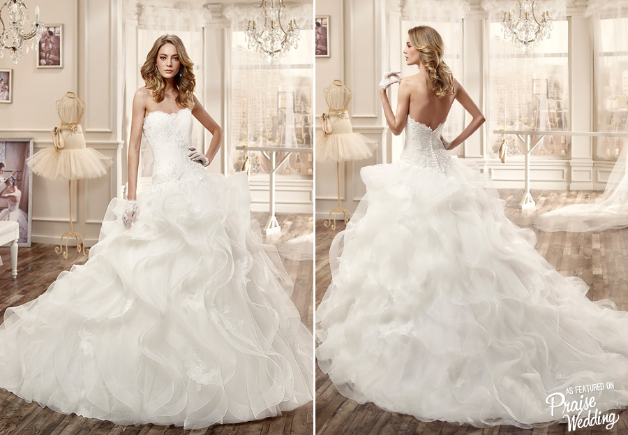 This classic princess-worthy ruffled gown from Nicole Spose is every girl's dream!
