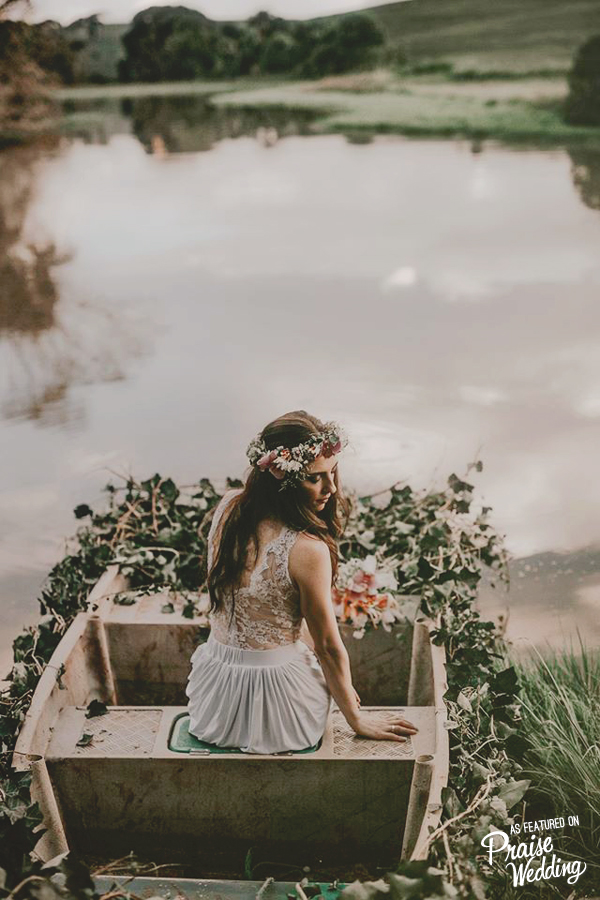How romantic is this lakeside bridal portrait filled with flowers and greens?