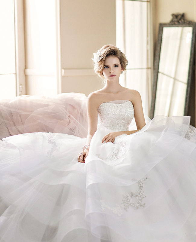 Fnara's bridal gown marries the classic and the new in a perfectly graceful package!