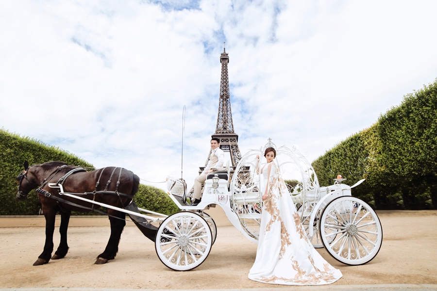 Fairy tale in Paris featuring a stunning golden white caped gown!