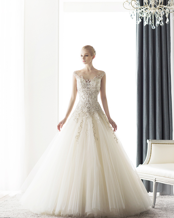 Vine-inspired jeweled lace bodice with a romantic tulle skirt, this Bonheur Sposa gown is like a dream!  