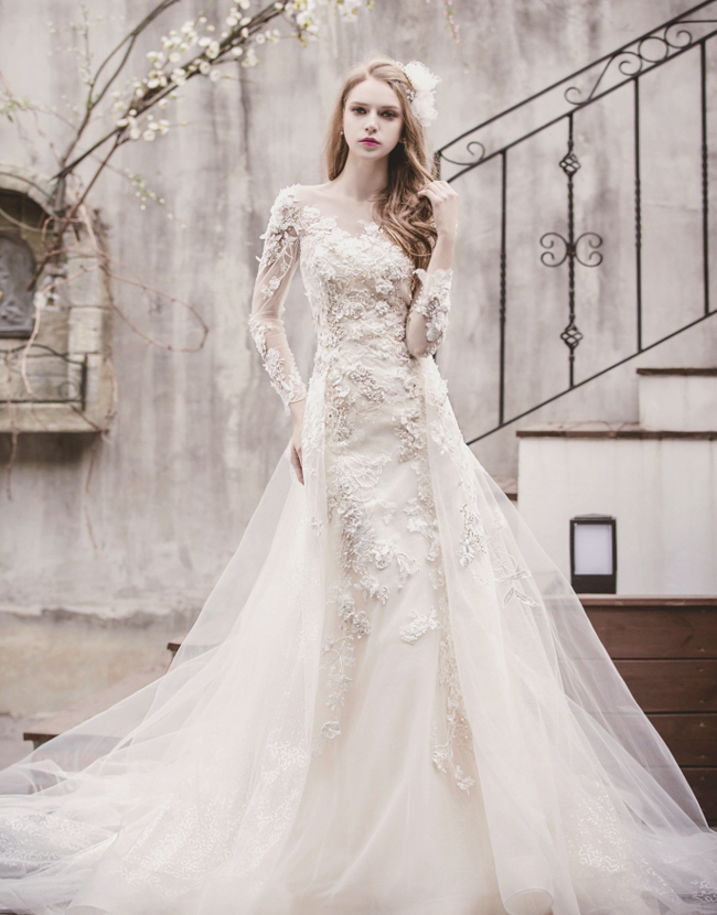 Sophisticated and romantic bridal gown by Tyche Dress defind by elegant silhouettes and delicate embellishments!