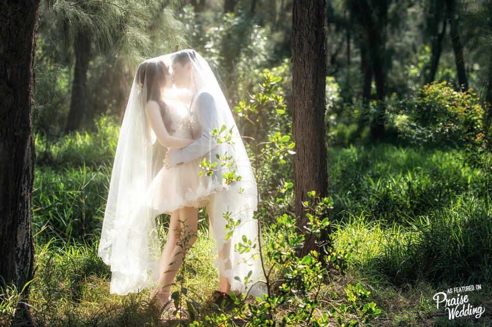 This magical forest wedding photo is packing on the romance in the best way possible!