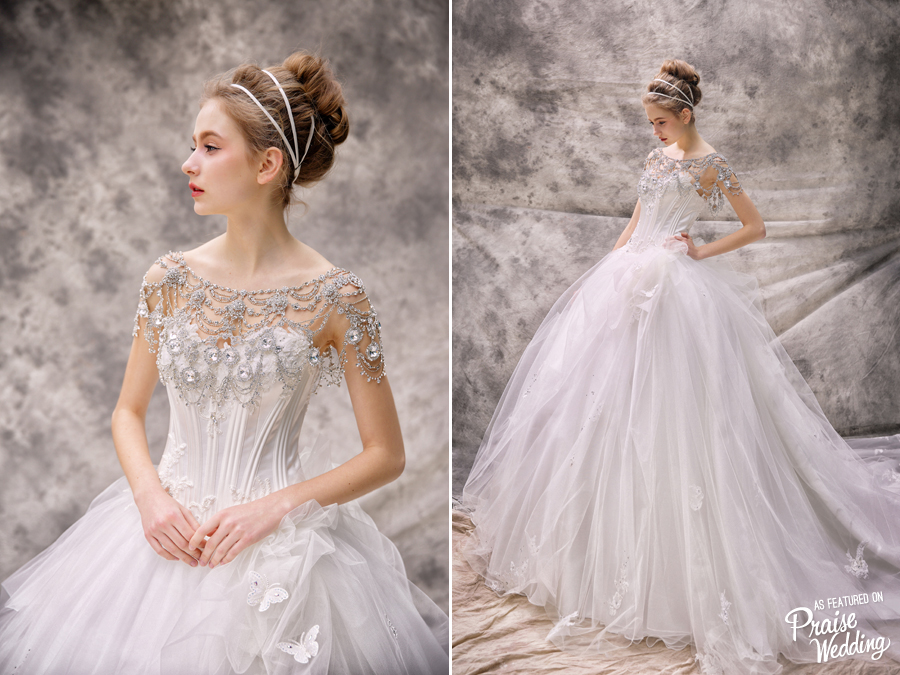Head over heels in love with this ball gown from Royal Wed, featuring 3D butterfly embellishments and a jeweled bolero!