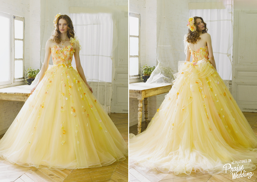 Say hello to the perfect spring gown from Yumi Katsura! The mini flowers blooming on this cheerful yellow gown are making our hearts dance!
