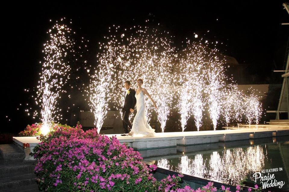 A reception entrance doesn't get more romantic than this m'dears!