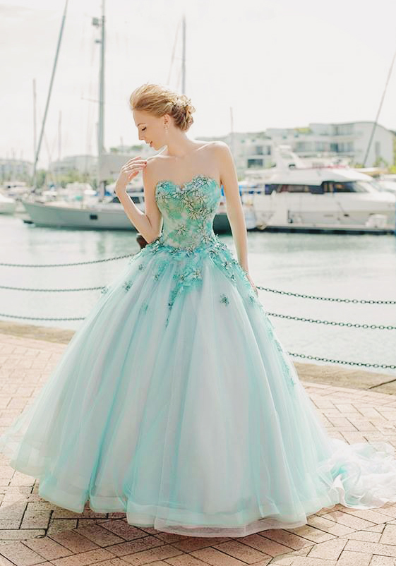 A lovely mint gown from White Link Bridal featuring 3D floral jeweled embellishments!