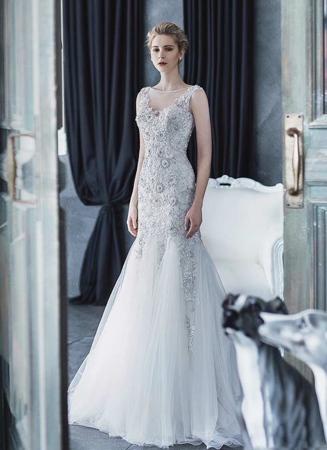An elegant wedding dress from Elisabeth Group featuring incredibly breathtaking embellishments!