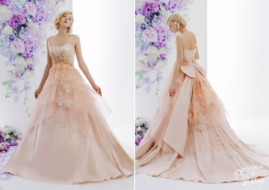 Elegant and feminine, this peachy pink gown from Estique has captivated us all!