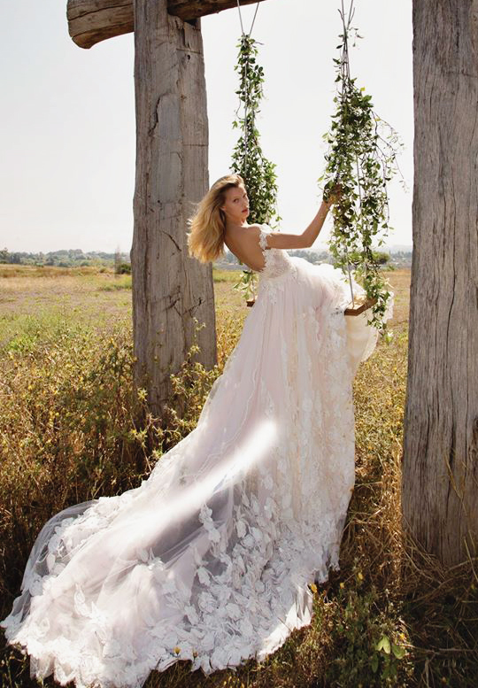 Can't take our eyes off this statement-making floral gown from Galia Lahav with an utterly romantic long train! 