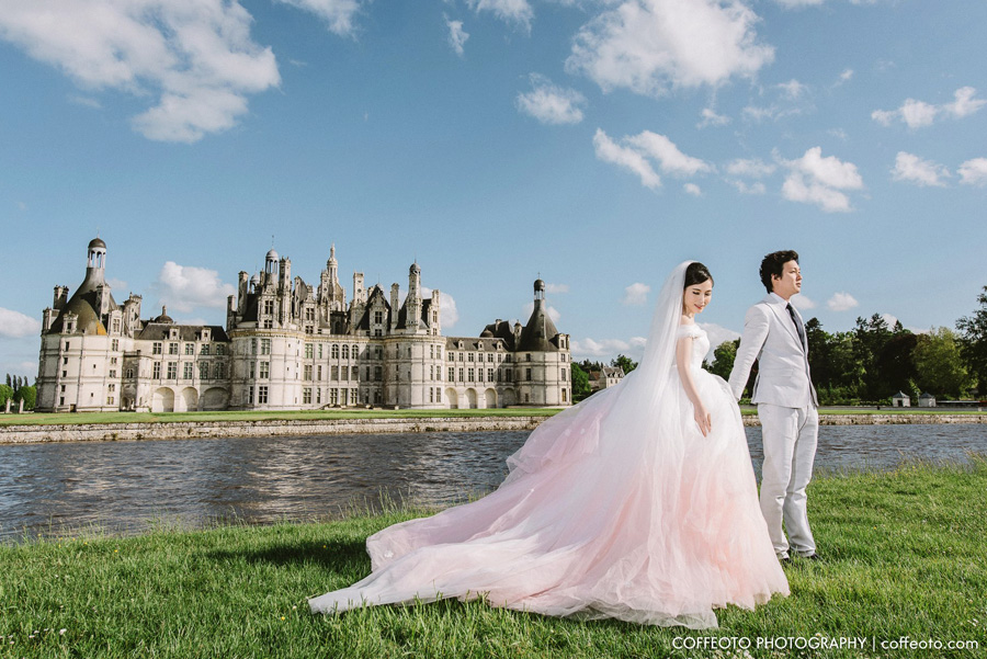 A fairy tale inspired prewedding photo featuring a sweet pink ombre wedding dress and amazing natural backdrop!