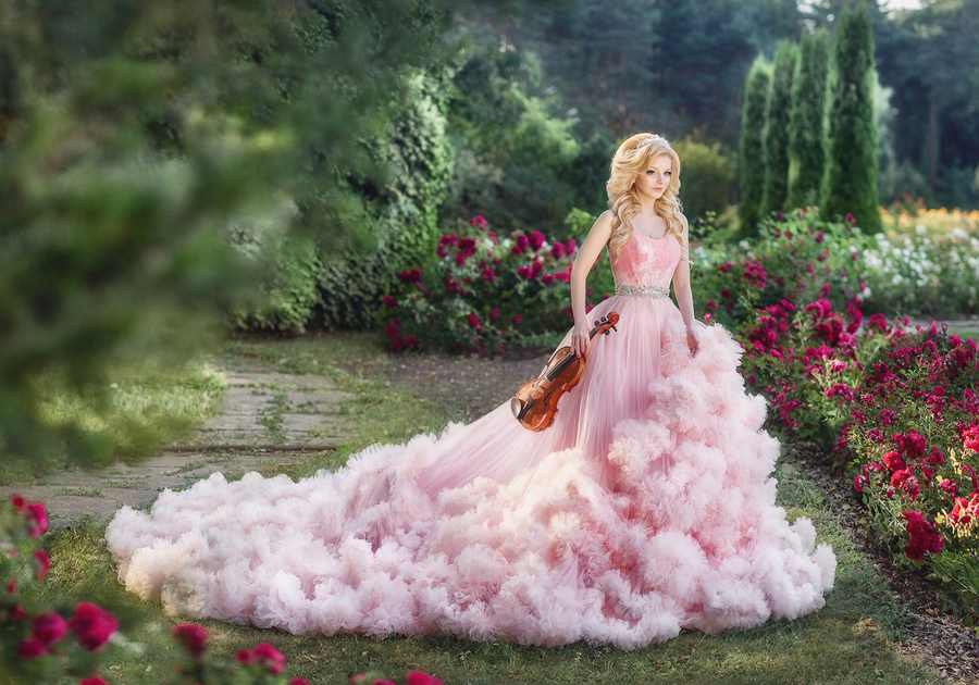 Sweet and romantic pink bridal gown from Art Dress featuring a cloud-like dreamy train!