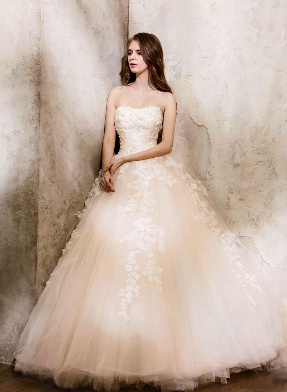 Contemporary and feminine, yet detailed and unique, this bridal gown from Bride Merci is oh so sweet!