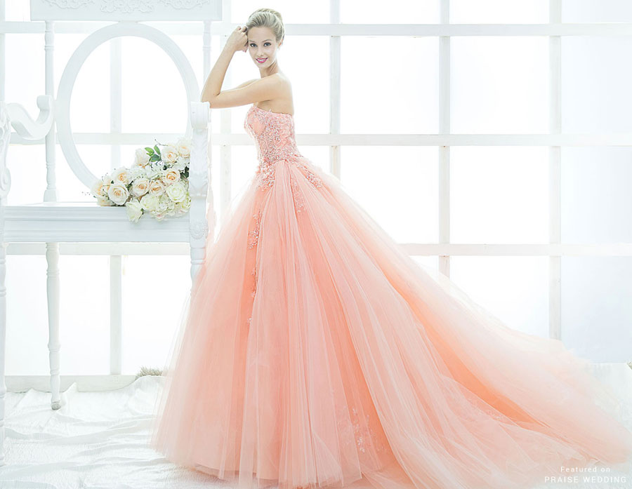 Blending peachy pink tones with jeweled embellishments, this La Belle Couture gown is splendidly romantic and sweet!