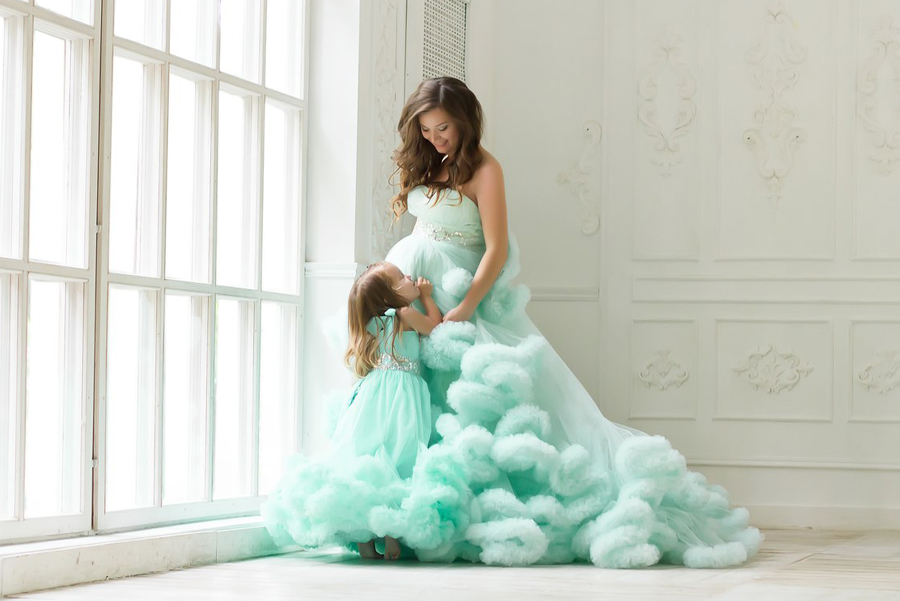 Cuteness overload! Princess-worthy maternity family photo featuring beautiful matching mint gowns!