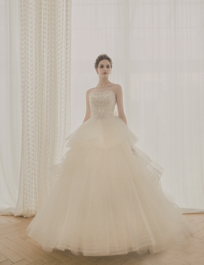This gown from Ireland Wedding featuring layers of romance is fit for a princess! 