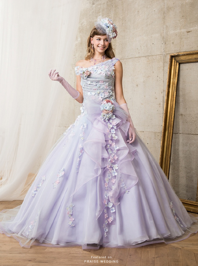 How adorable is this lavender gown from Mariarosa featuring lively blooming flowers?
