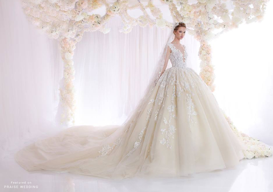 Our jaws are dropping over this ball gown from Ziad Nakad, combining lively laced florals with signature feminine cut.