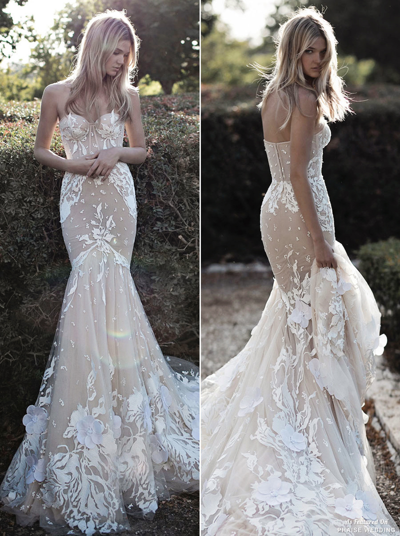 Unique Idan Cohen gown featuring a darling silhouette with incredibly breathtaking floral details!