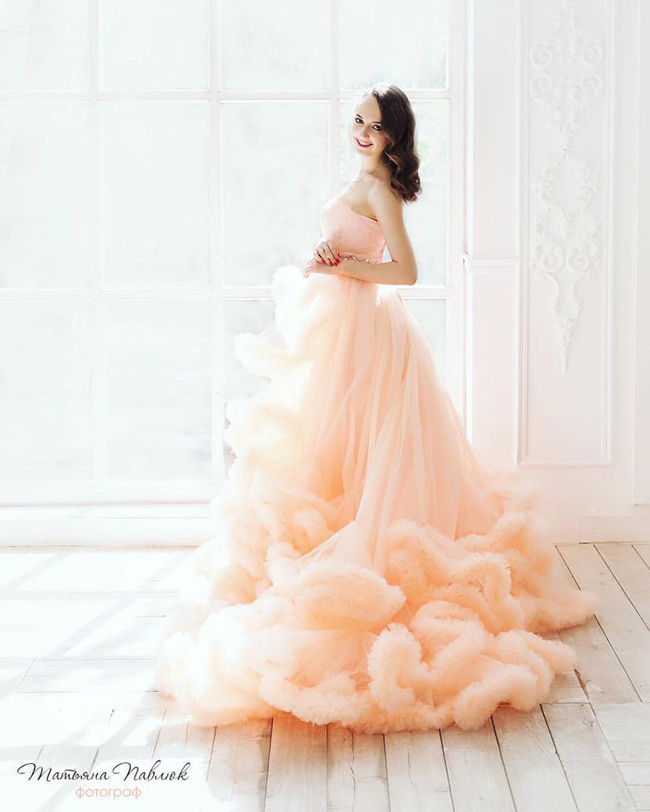 Utterly romantic peachy gown from Story Dress featuring dreamy ruffles!