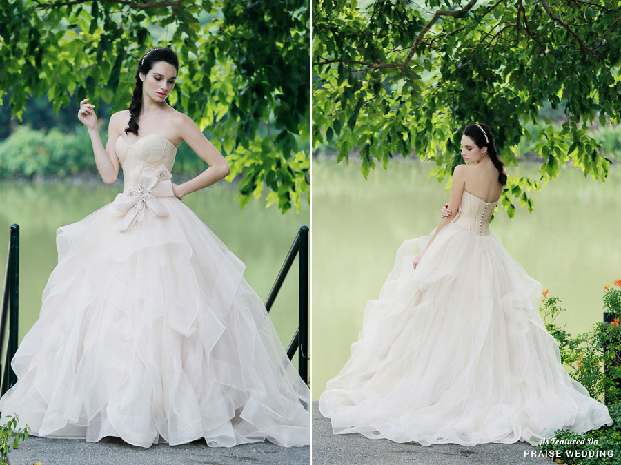 This stylish wedding dress from Z Wedding Design is the definition of pure romance!